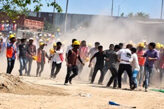 Workers clash with officials at the accident site. Infra Insiders